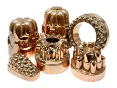 Six Victorian copper jelly moulds