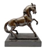 Bronze figure modelled as a prancing horse