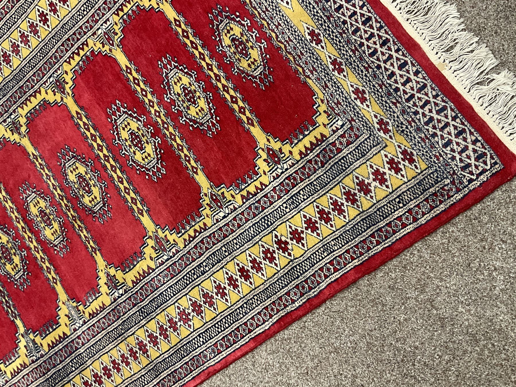 Persian red and yellow ground Bokhara rug - Image 2 of 4