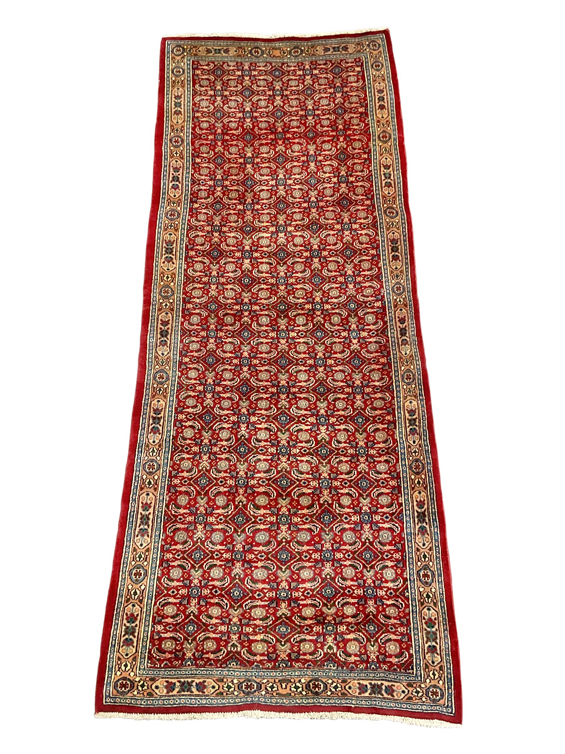 Persian red ground rug