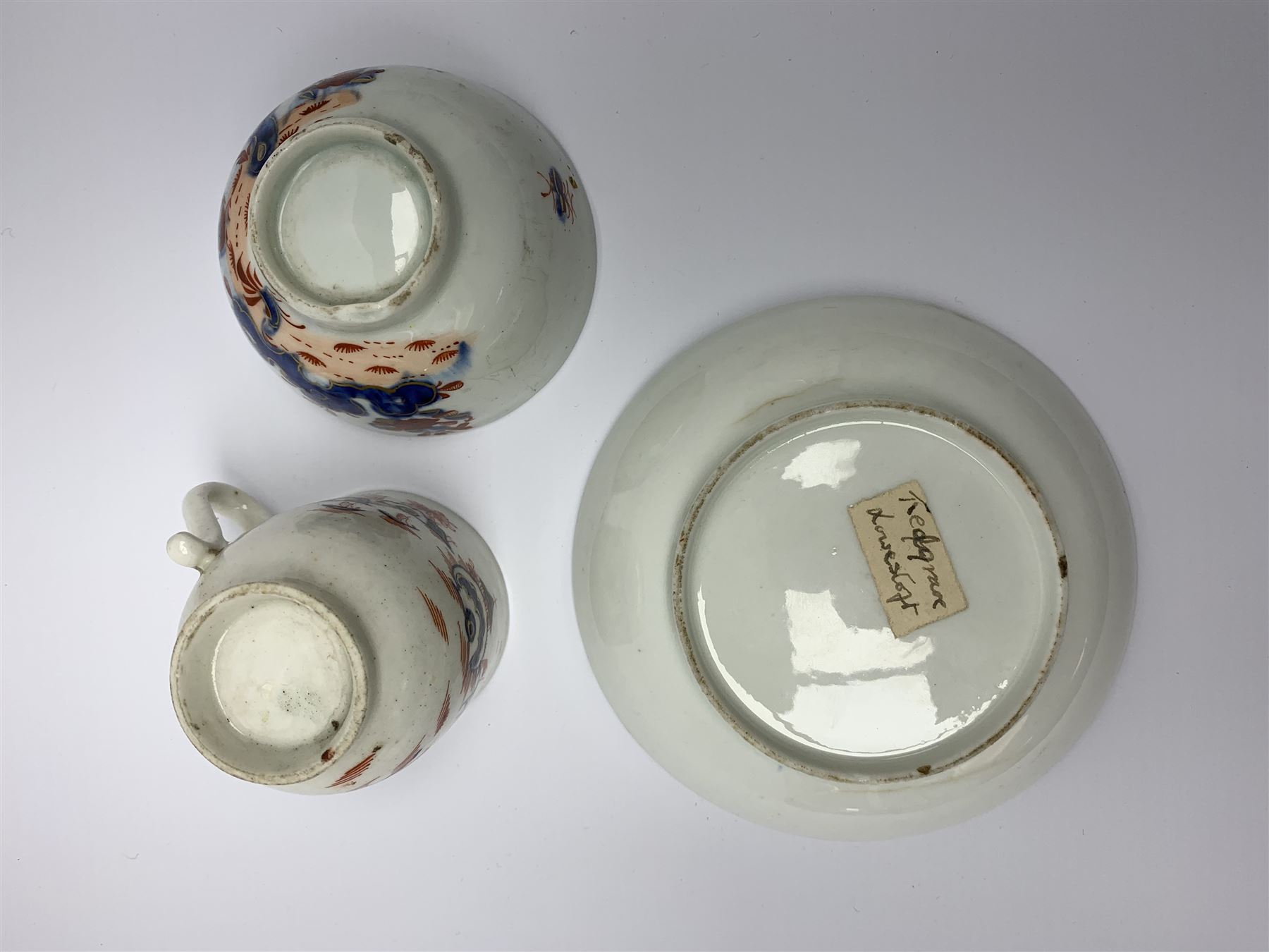 Late 18th Century Lowestoft coffee cup and saucer, circa 1870, decorated in the Dolls House pattern, - Image 5 of 5