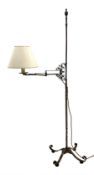 Wrought metal standard lamp, single cantilever adjustable branch on twist column with finial, out sp