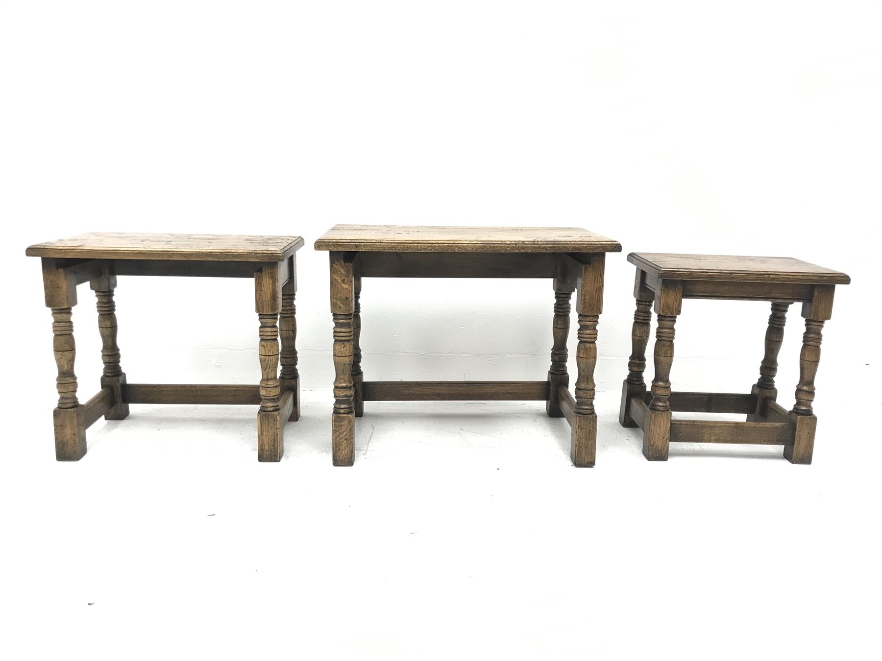 Traditional distressed light oak rectangular nest of three tables, turned legs, W59cm, D33cm, H47cm - Image 3 of 3