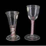 18th century drinking glass, the funnel bowl upon a double series opaque colour twist stem with red
