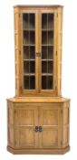 �Lizardman� oak corner cabinet