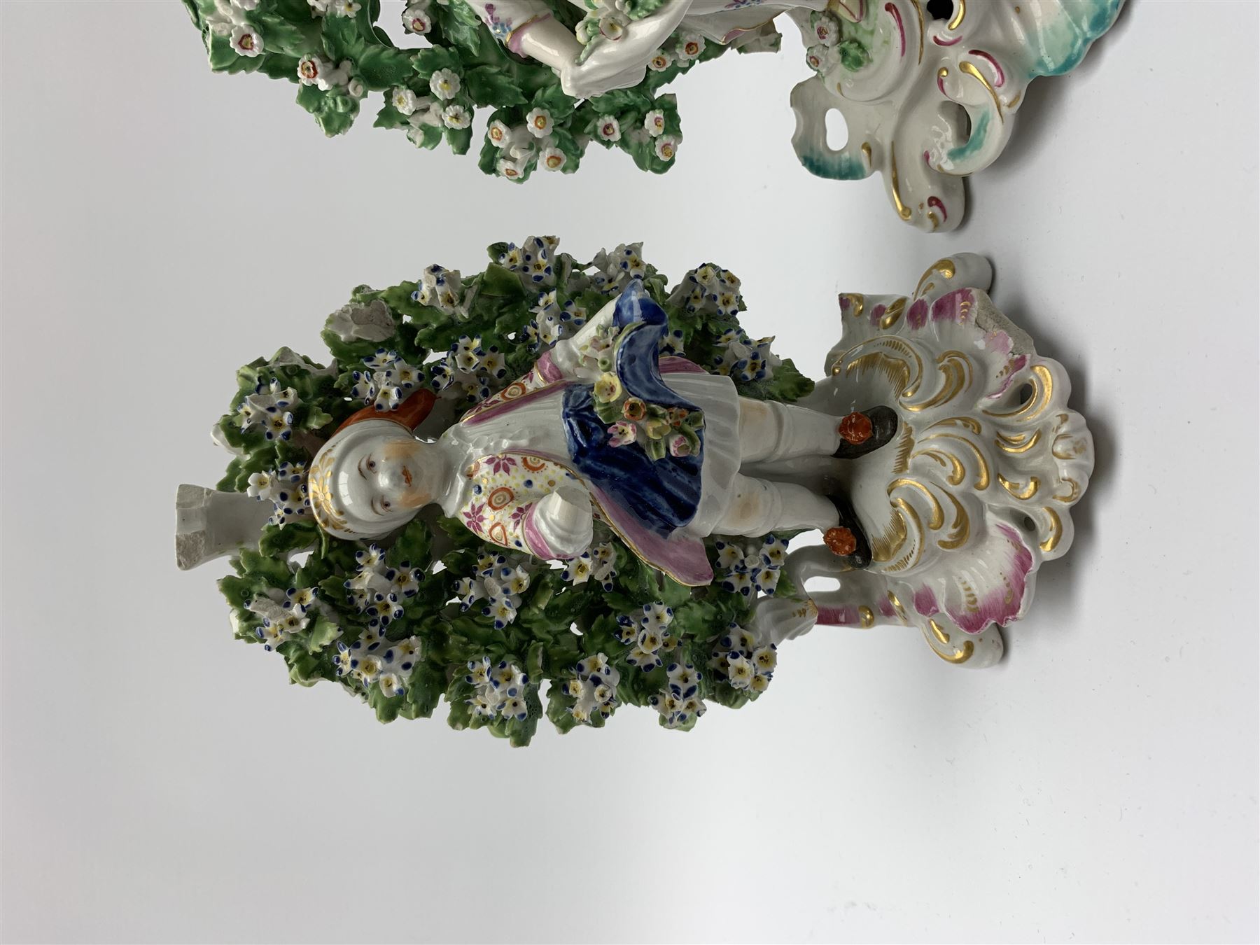 Near pair of bocage figures, the first an 18th century Derby example modelled as a young boy holding - Image 2 of 5