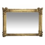 Large 19th century gilt wood and gesso overmantel mirror, plain column pilasters, the corners with s