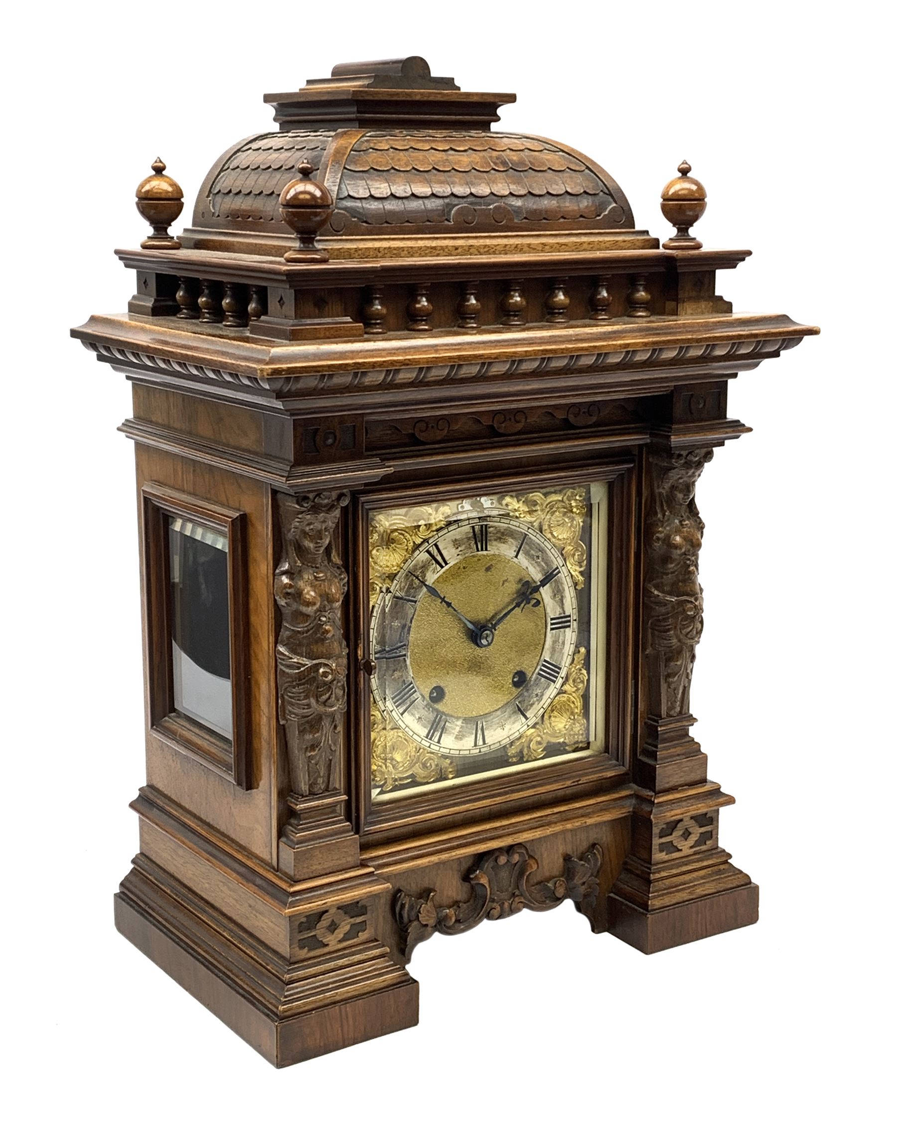 Late 19th century walnut cased architectural mantel clock, caddy pediment carved with tile effect ra