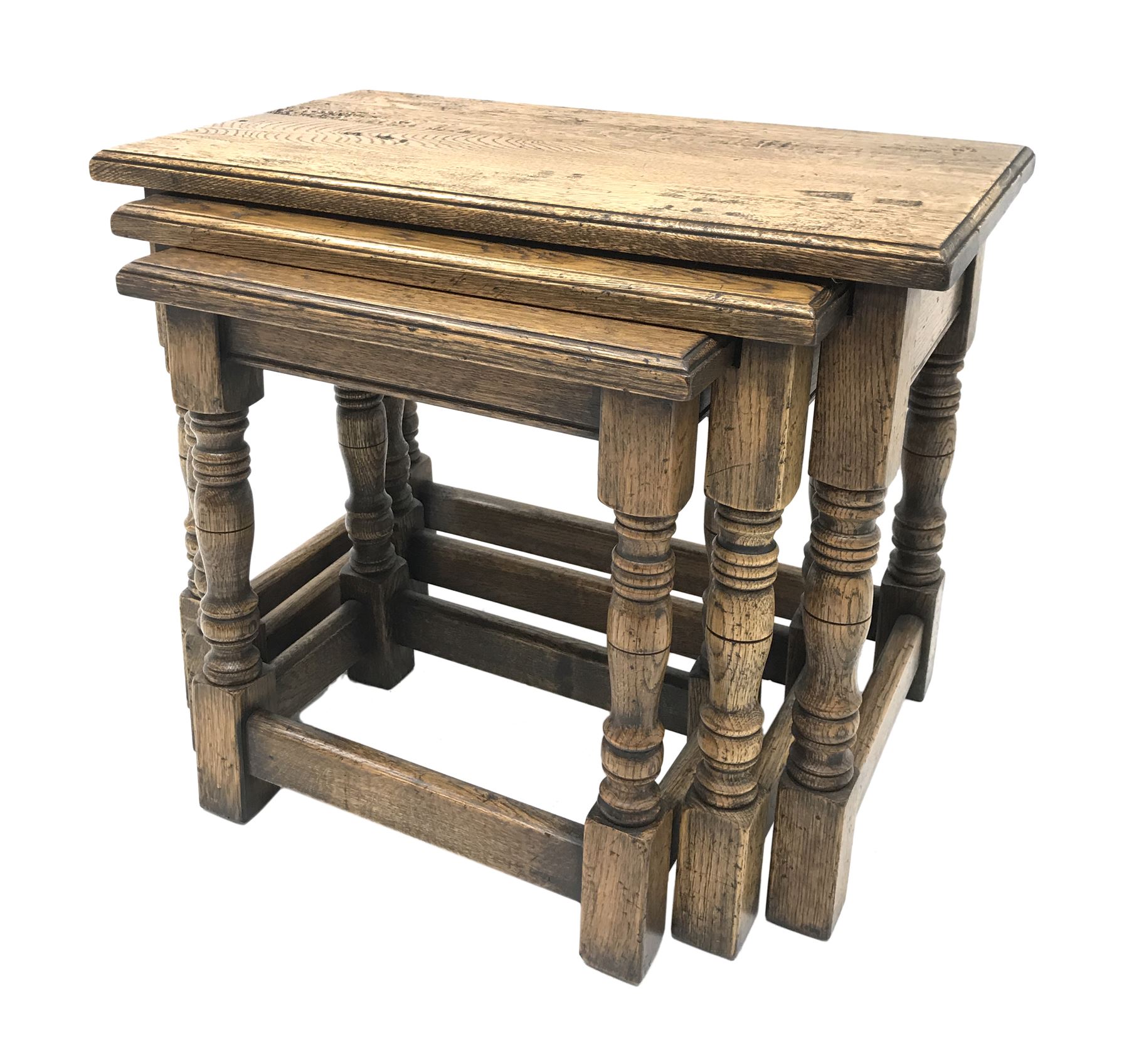 Traditional distressed light oak rectangular nest of three tables, turned legs, W59cm, D33cm, H47cm