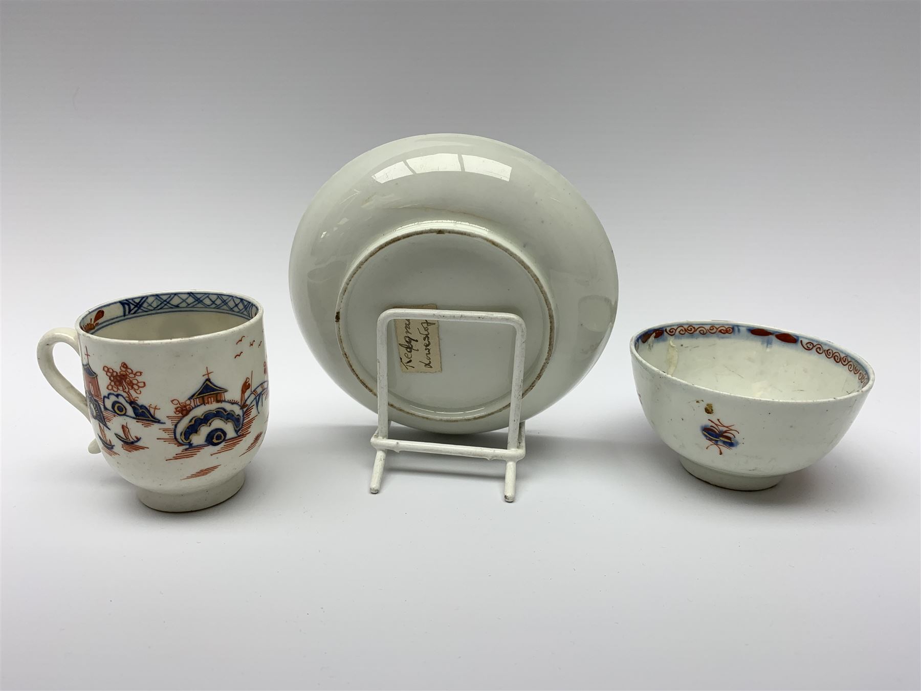 Late 18th Century Lowestoft coffee cup and saucer, circa 1870, decorated in the Dolls House pattern, - Image 3 of 5