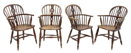 Set four early to mid 19th century elm Windsor armchairs