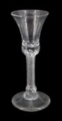 18th century drinking glass, the bell shaped bowl upon a single series basal knopped stem and conica