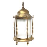 Large brass ceiling hallway lantern, cylinder form with domed top supported by a series of turned sp