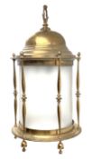Large brass ceiling hallway lantern, cylinder form with domed top supported by a series of turned sp