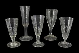 Five 18th century drinking glasses with part fluted bowls