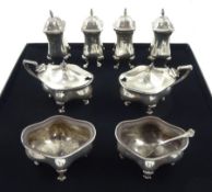 Edwardian silver eight piece cruet set by Deakin & Francis Ltd