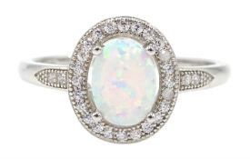 Silver opal and cubic zirconia ring