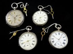 Four Victorian and Edwardian silver open face English lever pocket watches by Thomas Russell & Sons