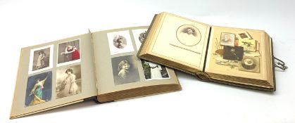 Album containing two-hundred and thirty Edwardian and later postcards including real photographic an