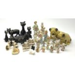 A collection of various ceramic figurines
