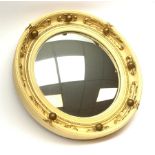 A vintage Atsonea convex mirror