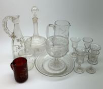Two early nineteenth century drinking glasses with part fluted bowls and knopped stems