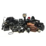 Vintage cameras lenses and accessories including Olympus 'OM10' camera body