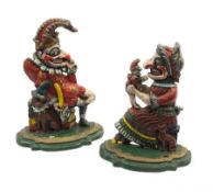 A pair of Victorian cast iron doorstops modelled as Punch and Judy