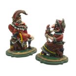 A pair of Victorian cast iron doorstops modelled as Punch and Judy