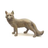 A composite figure modelled as a standing fox
