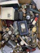 a large collection of wristwatches including Timex