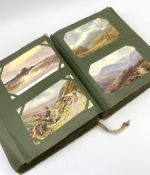 An Edwardian album containing approximately four hundred Edwardian and later postcards