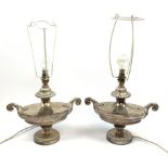 A pair of silver plated table lamps