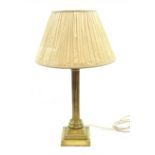 A brass Corinthian column table lamp