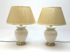 A pair of white crackle glaze table lamps