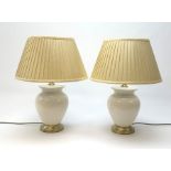 A pair of white crackle glaze table lamps