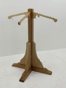 Light ash wood clothes stand, four out splay branches, on cruciform base, H128cm, W100cm