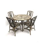 Hardened plastic garden table and four chairs, brushed gold, floral top, four supports, joining unde