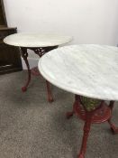 Pair cast iron Britannia pub tables, two red, small marble tops