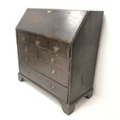 19th century oak bureau, fall front enclosing fitted interior above seven graduating drawers, ogee b