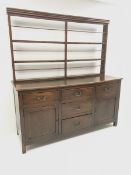 19th century oak dresser, raised three tier plate rack, five drawers, two cupboards, square supports