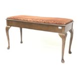 Early 20th century mahogany duet piano stool, upholstered hinged seat enclosing storage compartment,