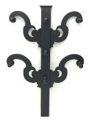 Victorian black painted mahogany coat stand, four shaped supports with seven pegs, H131cm, W89cm