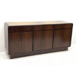 Late 20th century hardwood veneer sideboard, rounded rectangular front fitted with three drawers and