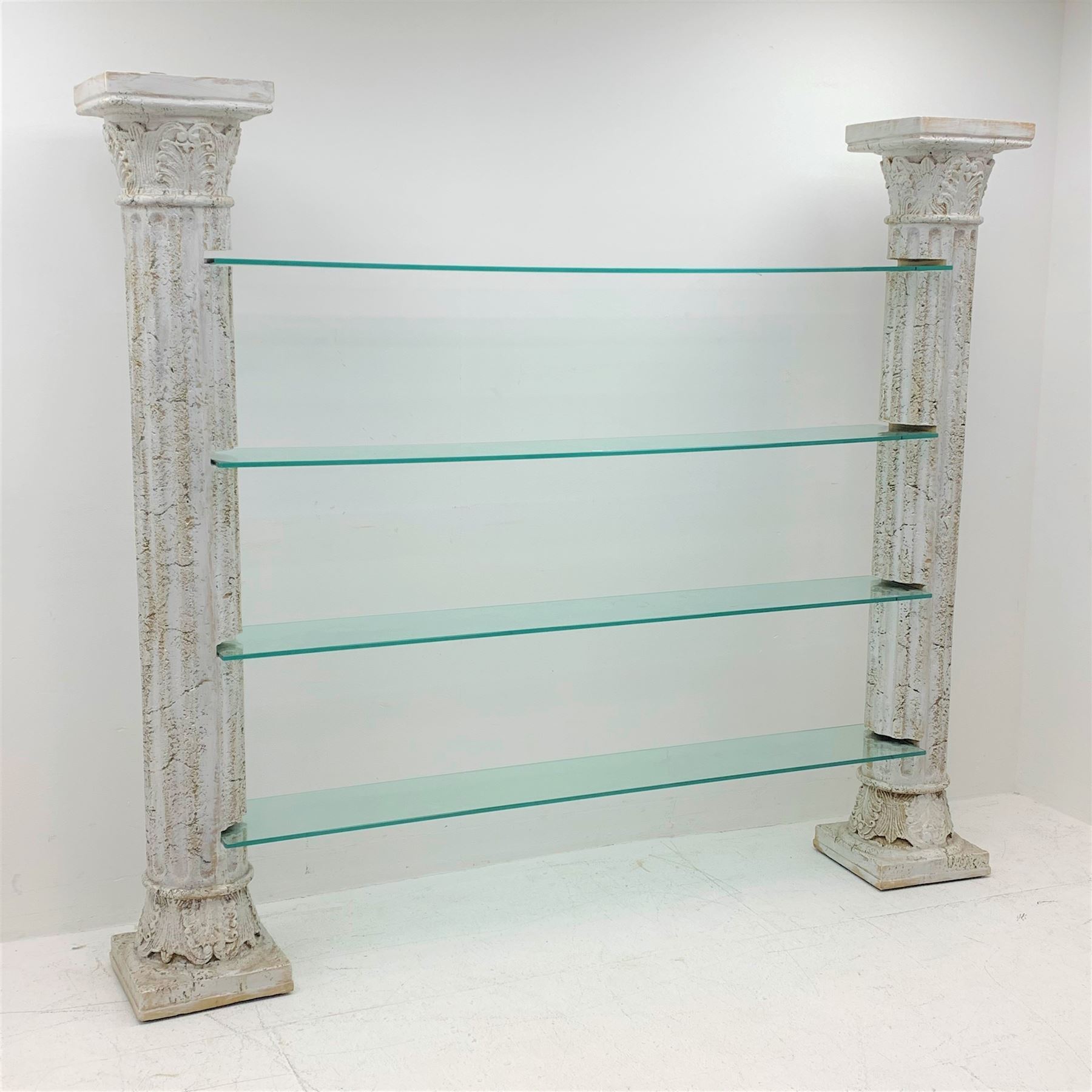 Architectural four shelf glass shelving unit supported by two Corinthian columns, W205cm, H179cm, D3