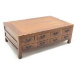 Large hardwood multi-drawer coffee table fitted with eight drawers each side, 130cm x 84cm, H46cm