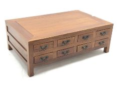 Large hardwood multi-drawer coffee table fitted with eight drawers each side, 130cm x 84cm, H46cm