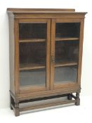 Edwardian oak bookcase display cabinet enclosed by two glazed doors, W96cm, H128cm, D31cm