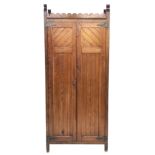 Late Victorian Aesthetic movement pitch pine and oak hall wardrobe, two paneled doors enclosing hook