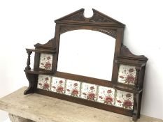 Late Victorian walnut mirror back, sloped arch pediment carved with scrolled acanthus leaves above a